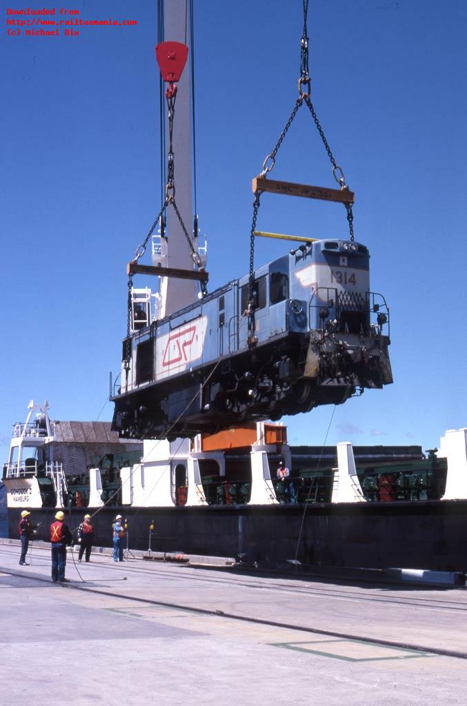 It is now over 30 years since the ZC class locos arrived in Tasmania. For a short period these locos dominated train working but their numbers dwindled as traffic declined and the DQ locos arrived. 1314 (ZC15) is unloaded at Bell Bay on 31 October 1988