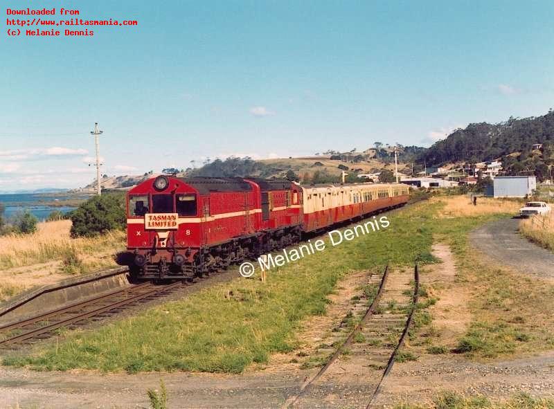 X8 and X10 haul the westbound <em>Tasman Limited</em> through Howth. February 1974