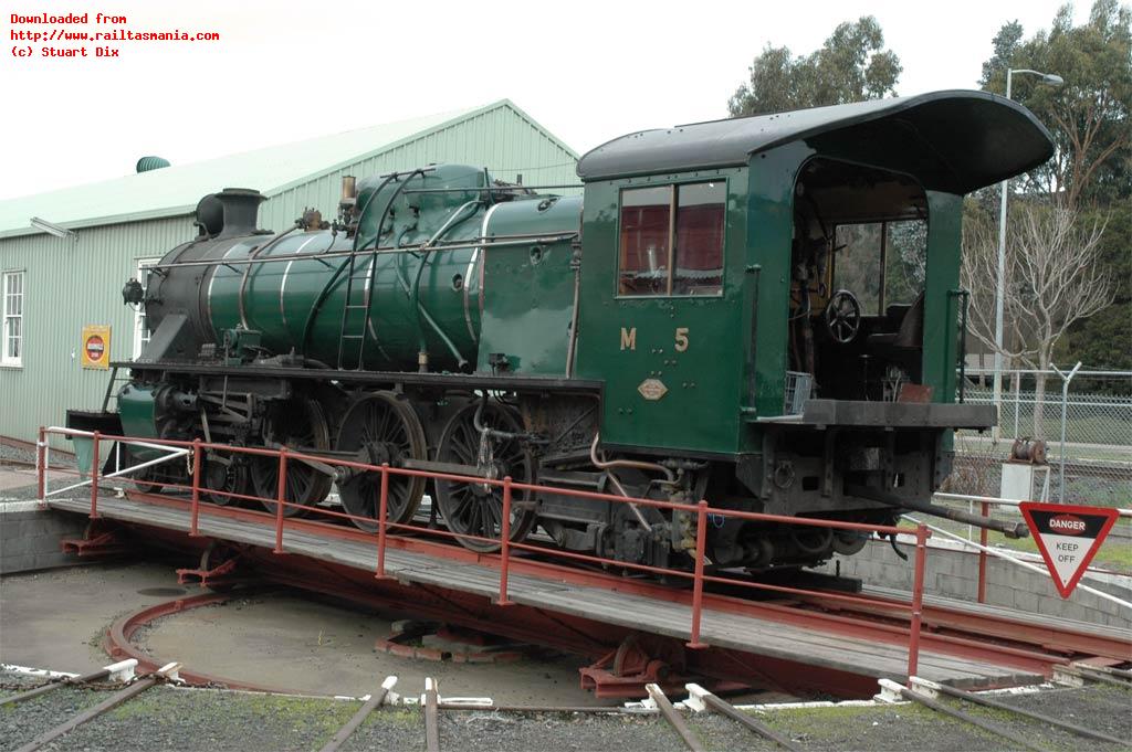 Having been split from its tender and turned, the front part of M5 waits for its next move around the yard. July 2005