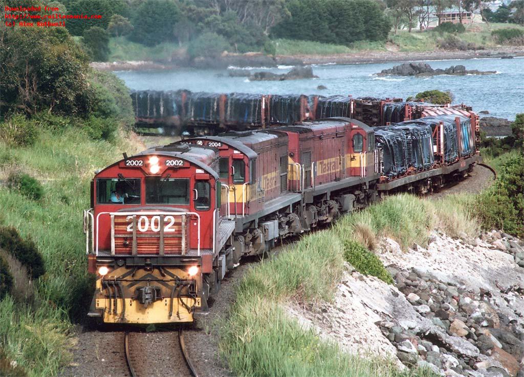 Late running and loco failures resulted in some different loco allocations. On 24 November eastbound paper train 531 was unusually hauled by DQ locos 2002-2004-2005 as the train skirted Bass Strait near Lonah.