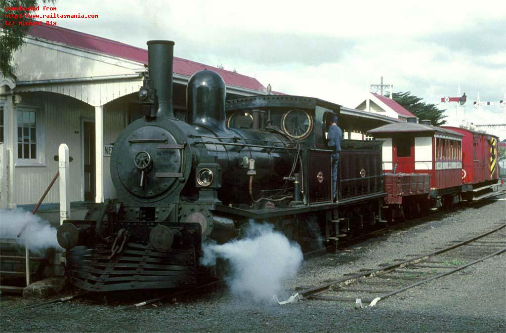 Locomotive C22 at the head of a short train comprising wagon A 159, carriage A+17 and guards van DB3, September 1998