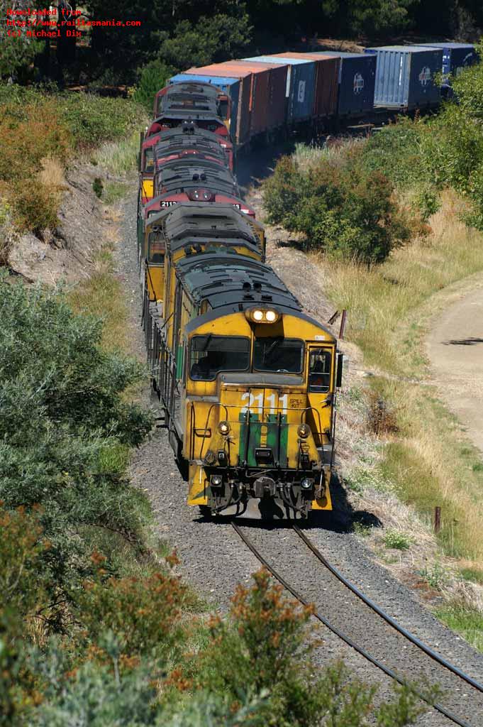 Locos Z2111-ZA2114-Z2113-Z2112, with D2021 and DQ2004 dead attached, head the Sunday Hobart to Boyer train 164 at Ravenswood on the Derwent Valley Line on 17 February 2008