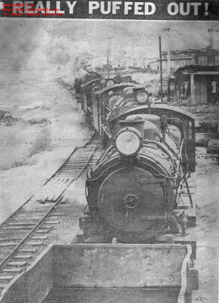 From a contemporary newspaper:<br>

This is the story of the death of three old trains<br>
Their names are Q-6, Q-14 and Q-15 and they are very old and tired.<br>
The oldest of the proud black trio of iron horses is Q-6.<br>
She was born at the Perry Engineering works in Adelaide in 1923 and until her retirement several years ago logged a million miles.<br>
Next is Q-15, who logged 616,000 miles. Q-14s tally is a mere 600,000. These two were built by Clyde Engineering, Sydney in 1937.<br>
Yesterday, the three trains were towed from the Invermay railway yards to Rocherlea by a diesel locomotive - with a steam train called H-6 pushing. <br>
The three Qs looked a forlorn sight as they went to their graveyard. <br>
Their fires were out but they still managed to make a sad train like sound as the air was forced through their engines by the pistons.<br>
There was no steam, no smoke and their old wheels squeaked and groaned a little as they trundled across railway lines for the last time.<br>
Waiting at Rocherlea Station, oxy-acetylene cutting equipment at the ready was Mr. J. McNamara, of Melbourne, and two workmen, who will break-up the old trains into pieces to be shipped to Formosa. <br>
In Formosa Q-6, Q-14 and Q-15 will be melted down into sheets of shiny new steel. <br>
And from there? <br>
They will be shipped back to Australia to be used for machinery, a ship or maybe new diesel train