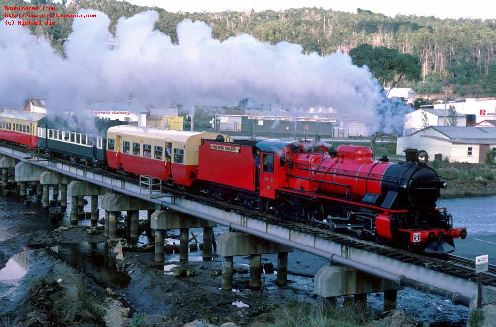 In  May 1986, MA2 headed the first steam-hauled, main line passenger train in 10 years. The train from Devonport to Burnie and return is seen crossing the Emu River at Burnie on the final stage of its outward journey.