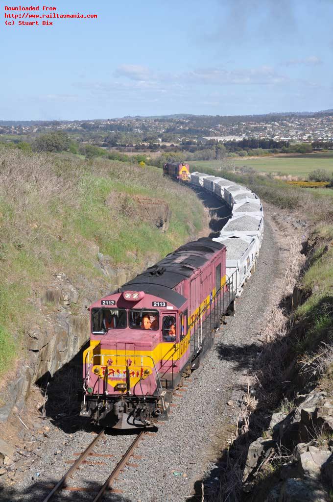 Z locos 2113 and 2112 top and tail Bell Bay Line ballast train 3XN at the Vermont Road overpass at Mowbray on 5 October as part of the rehabilitation of the line