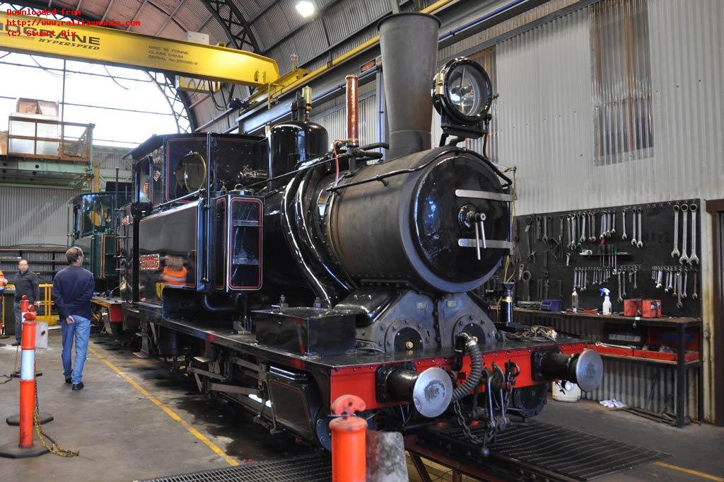 Black painted No. 3 (front) stands ready for service later in the week, whilst green painted No. 5 is reassembled following boiler inspection and maintenance inside the workshop building at Queenstown in November 2014.