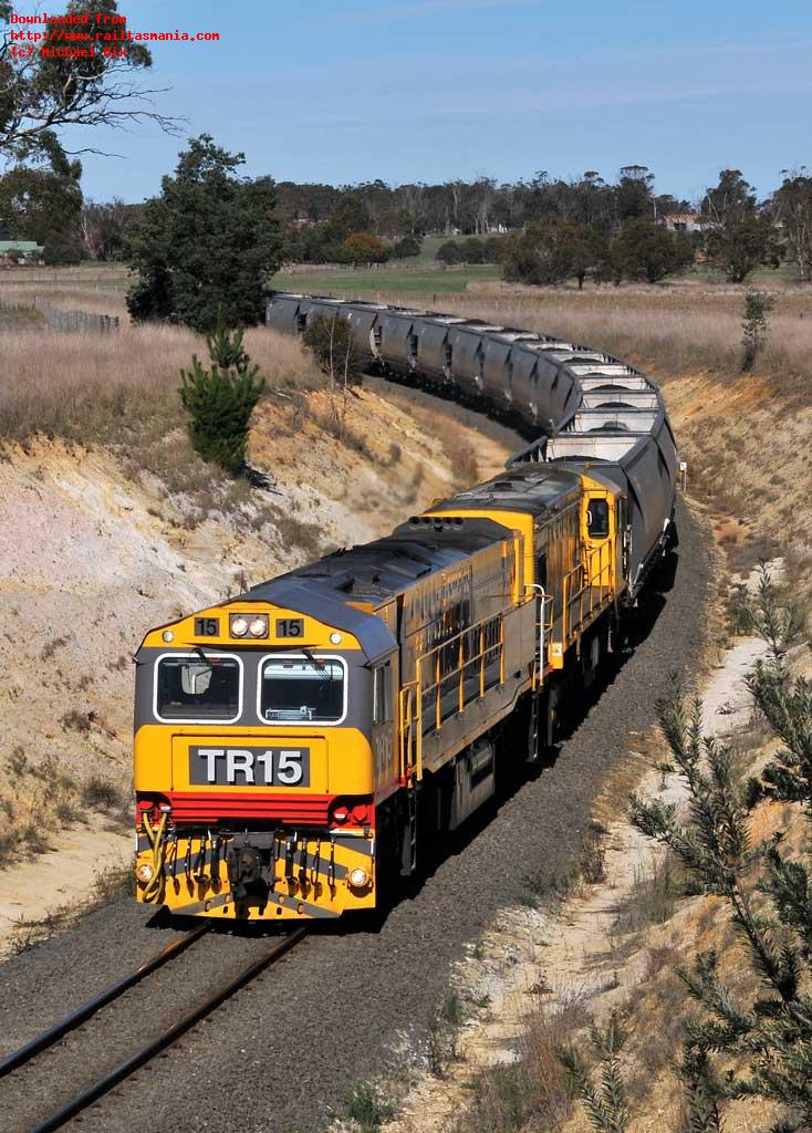 Although the TR class now dominate workings on all but the Melba Line, other locos are occasionally seen. On 20 April 2015 TR15 and DQ loco 2010 head coal train 246 though the Powranna deviation