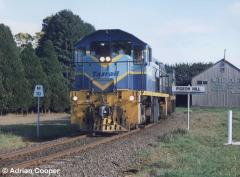 1107 leads a loaded Primrose concentrates train through Pigeon Hill. July 1999