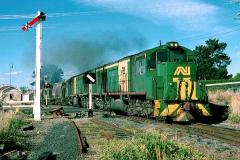In classic Australian National green livery, air-braked loco Z1 leads ZA4 and number 4113 Boyer coal
