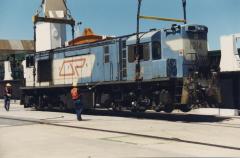 1314 is lowered onto Tasmanian soil for the first time at Bell Bay, October 1988