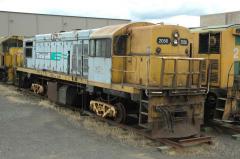 Having given up its bogies to keep the DQ class active, stored QR2056 sits on workshop bogies in the